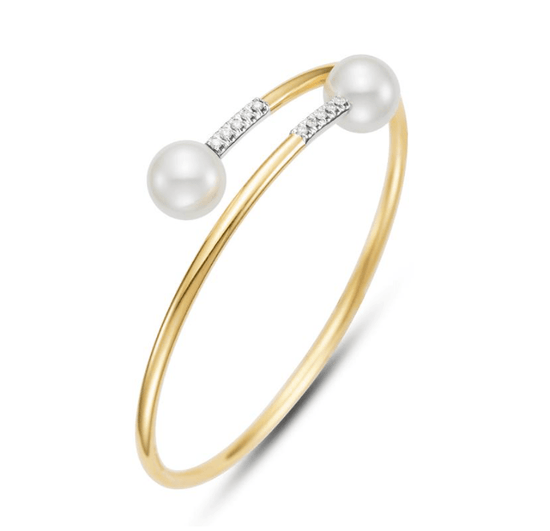 Spring gold cuff bracelet with diamond ends and 9.75mm freshwater pearl tips 18kt yg - Gaines Jewelers